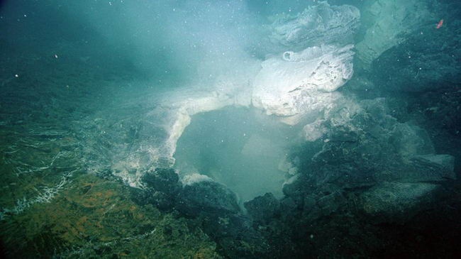 Hot, microbe-rich fluids flow out of a "cauldron" in a seafloor lava flow.